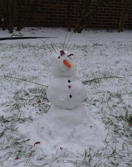 toddler's first snowman